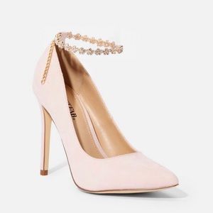 Pink jeweled pumps